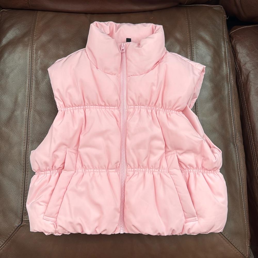 Adorable pink puffer vest!